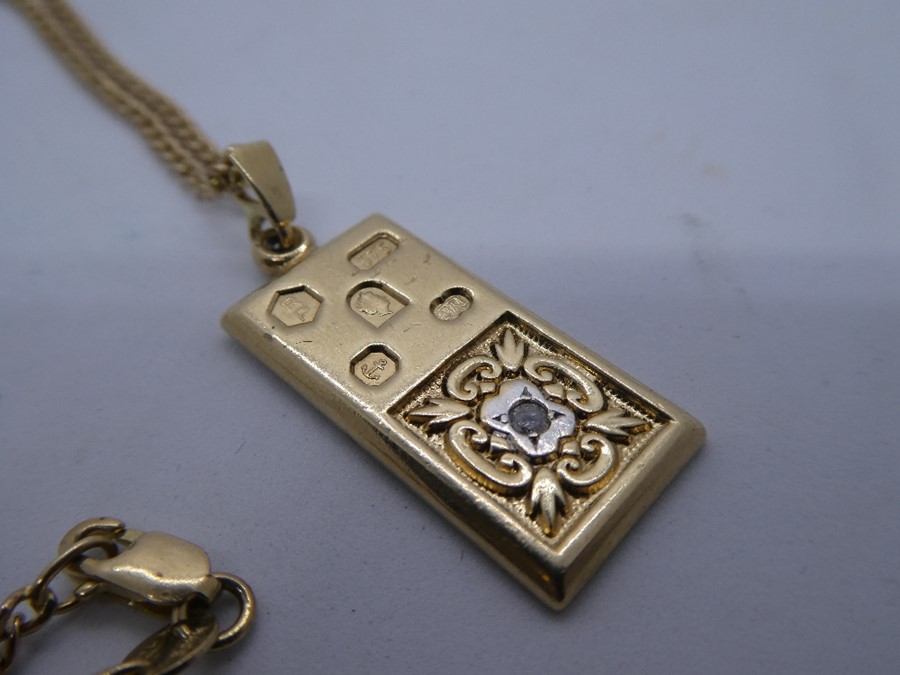 9ct yellow gold neckchain hung with a 1/4 ounce pendant in the form of a bullion bar inset with a wh - Image 2 of 3