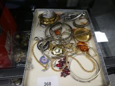 Costume jewellery to include large yellow metal cameos, necklaces, amber coloured pendant, silver ba