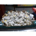 A tray of crested china including many tanks and 6 related books