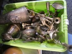 A box of mixed brassware to include figures, candle sticks, a boot etc