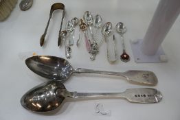 A silver lot comprising of various spoons, foreign flatware and tongs, 8.69 ozt approx
