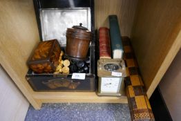 A boxwood chess set, a brass carriage clock, a rolling chessboard, an oriental tea caddy and sundry