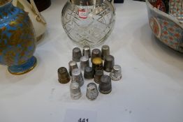 A small quantity of thimbles, some silver and a silver coloured glass bowl