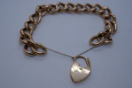 9ct rose gold bracelet with heart shaped clasp and safety chain, marked 375, 24.9g in a blue leather