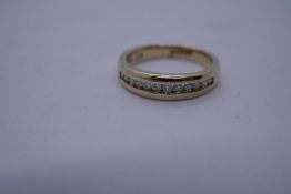 9ct yellow gold diamond channel set band ring, size N, 3.9, marked 375