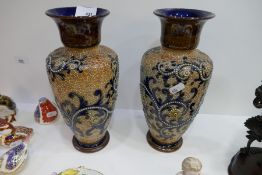 A pair of Doulton Lambeth baluster vases, the base bearing initials BN, size 28cms