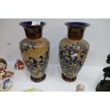 A pair of Doulton Lambeth baluster vases, the base bearing initials BN, size 28cms