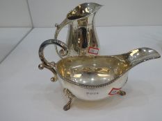 A high quality silver milk jug, heavy, hallmarked Sheffield 1937, Harrison Brothers and Hawson, with