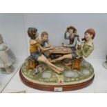 Capodimonte, a large figural group of four card players titled cheats on wooden base