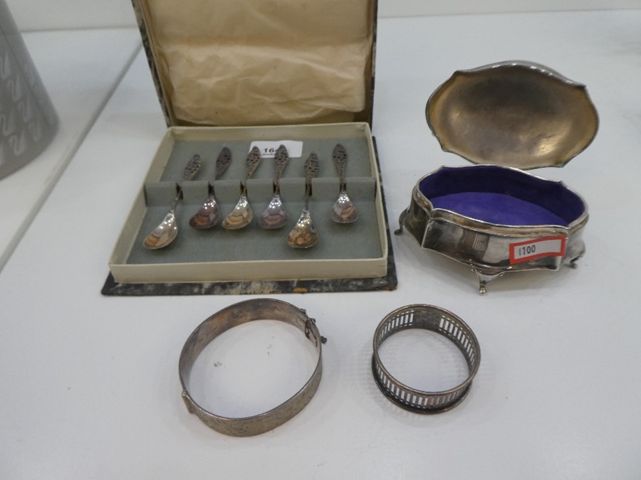 A mixed lot to include a silver bangle Birmingham 1970, LJM, a silver pierced napkin ring, a silver