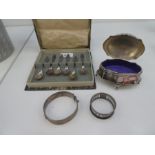 A mixed lot to include a silver bangle Birmingham 1970, LJM, a silver pierced napkin ring, a silver