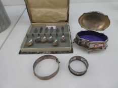A mixed lot to include a silver bangle Birmingham 1970, LJM, a silver pierced napkin ring, a silver
