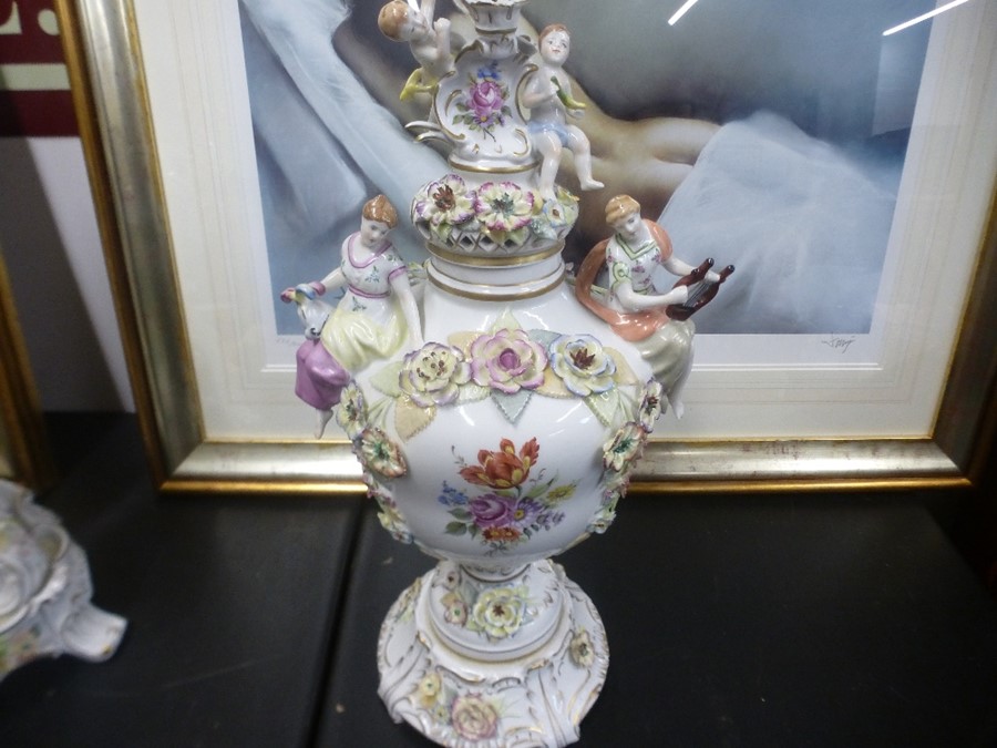 20th Century German porcelain clock garniture having floral encrusted and figural decoration, the cl - Image 3 of 4