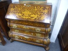 An antique Dutch marquetry bombe bureau having well interior with three long drawers 120cm