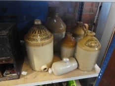 A selection of stoneware jugs, one inscribed R-White Brewery, London & Birmingham