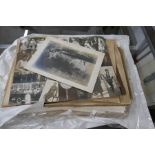 A quantity of old black and white photographs