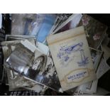 A box of assorted ephemera, mostly containing post and cigarette cards