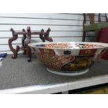 A 20th Century Chinese bowl, interior decorated with fish 68cm on wooden stand