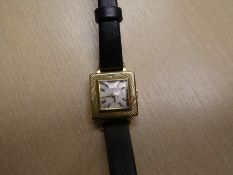 Vintage 18ct yellow gold cocktail wristwatch, jaeger lecoultre, case marked 750, on a black leather