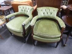 A pair of late Victorian tub armchairs having inlaid decoration with button back.