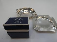 A silver lot comprising of a Mappin and Webb napkin ring in a box, a silver ash tray and a European