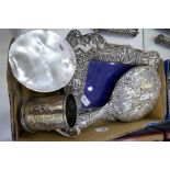 A mixed lot comprising a silver cup, silver bracelet and pendant, silver backed mirror, silver to