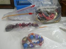 Small basket of mixed costume jewellery