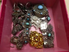 Box containing various Egyptian, white metal and silver jewellery, pill box, pill ring, most set wit
