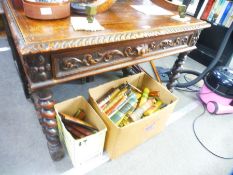 Victorian carved oak writing table having one long drawer on barley twist supports, 91cm wide