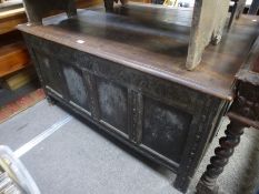 Antique oak coffer having panelled front with carved decoration, 135 cm
