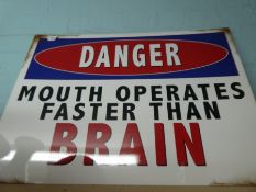 Large sign 'Mouth operates faster than brain'