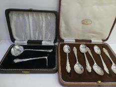 A silver Christening set hallmarked Birmingham 1942 London Ltd, and a set of six silver spoons Sheff