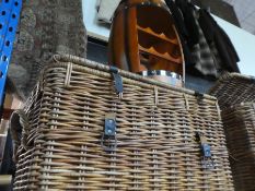 Two large wicker baskets, wine holder in shape of a barrel and a wicker picnic basket