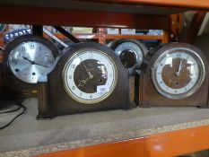 Four wooden mantle clocks two marked Smiths, all with keys