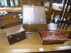 Old oak sloping stationery cabinet, a crocodile leather attache case and sundry