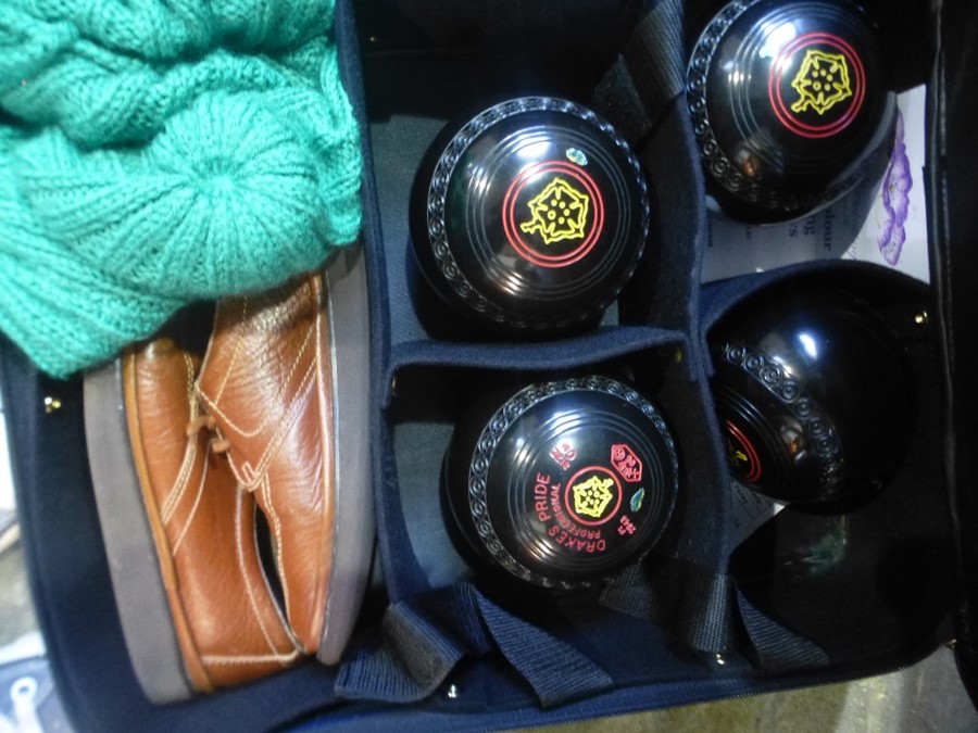 Cased set of boules and shoes