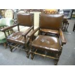 A pair of oak open armchairs