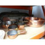 Selection of copper dishes and pans - some with brass and wooden handles
