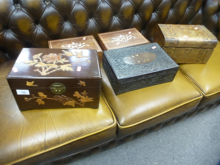 Oriental casket having decoration of carved leaves and flowers and 4 other boxes