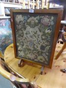 A tapestry fire screen