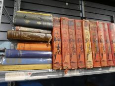 A shelf of hard back books, History of War, and fishing books