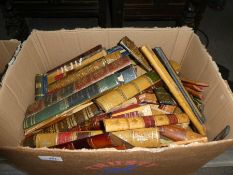 A quantity of leather and similar book spines, 2 boxes