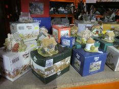 A large quantity of Lilliput Lane houses with boxes approx 40 plus