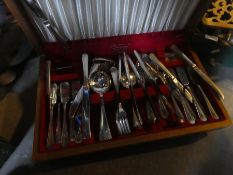 A box of brass items including coffee pots, oil lamps AF and a part cutlery set