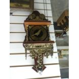 Brass and wood pendulum wall clock