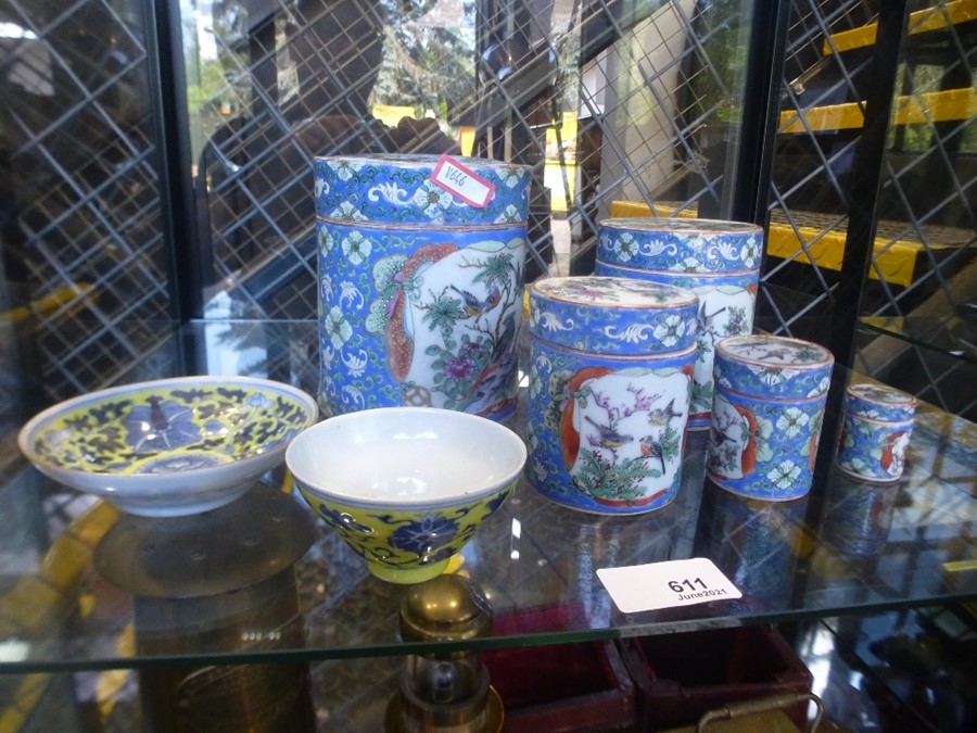 A set 5 Chinese concentric canisters decorated with birds and a Chinese bowl and Saucer with 4 chara