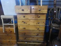 Two pine chest of drawers and a small pine storage unit with drawer and cupboard