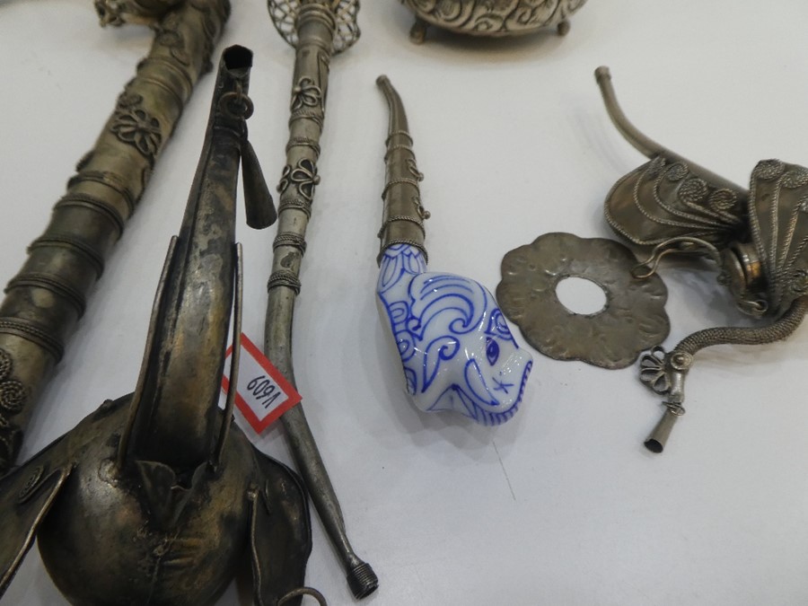 A selection of possibly Chinese white metal pipes and other artefacts, with possibly Indian white me - Image 4 of 4