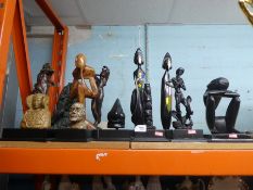 A selection of carved figures depicting cultures from around the World