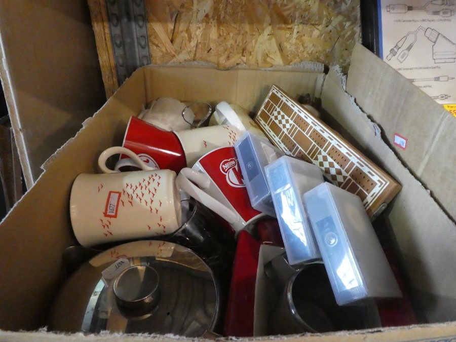 A box of china mugs, glasses, old games and a boxed cutlery set